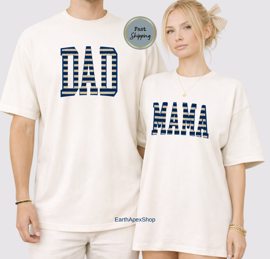 Two people wearing t-shirts with 'DAD' and 'MAMA' text on a plain background.
