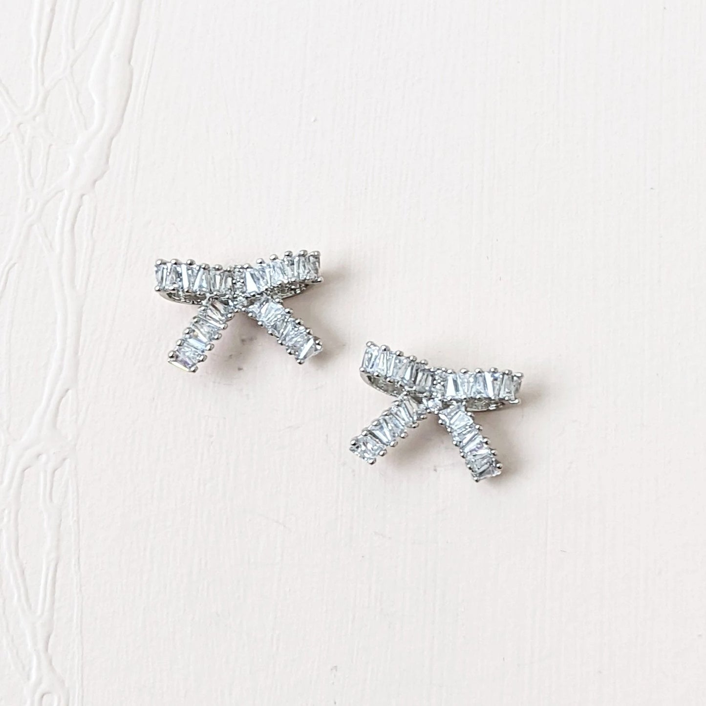 bow statement earrings