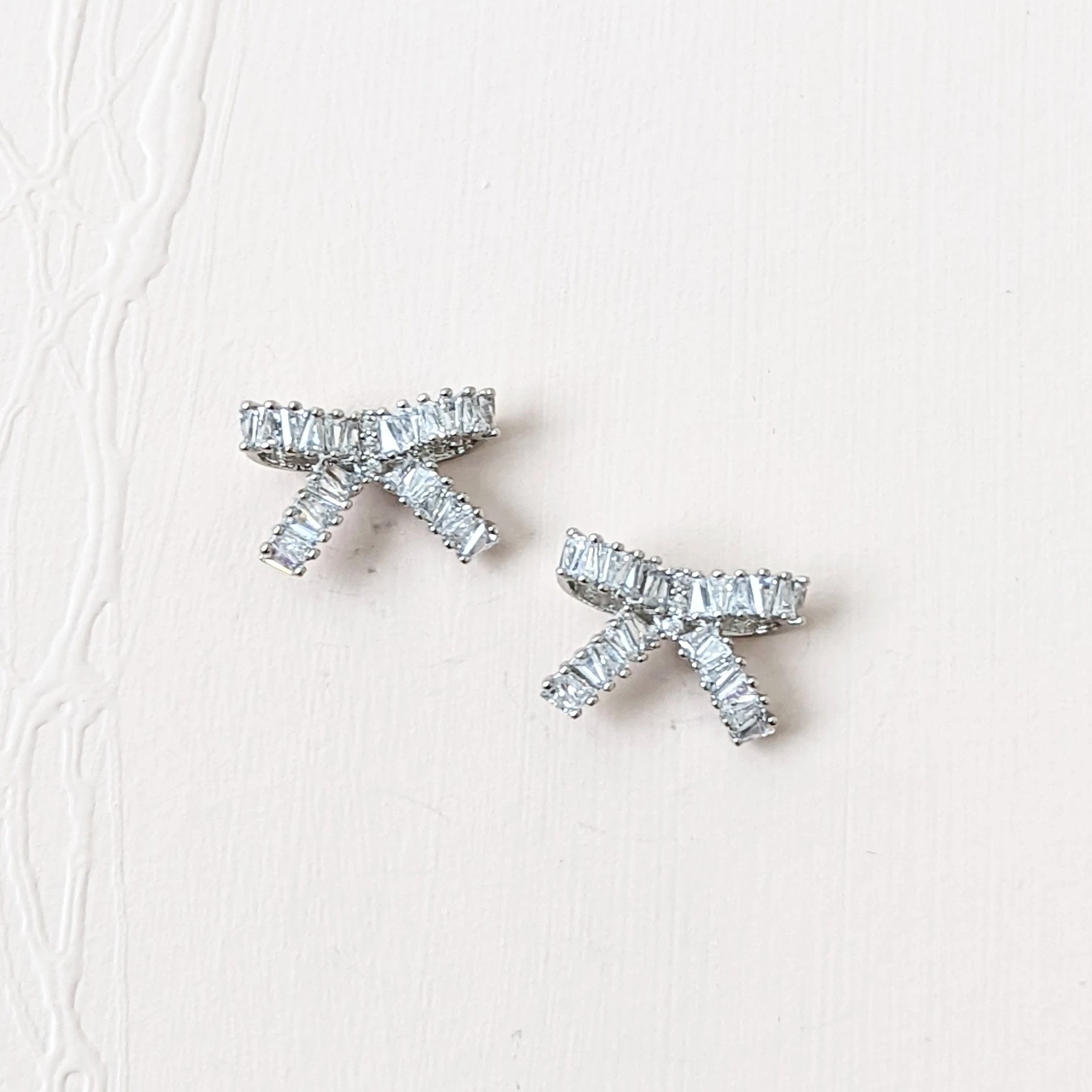 bow statement earrings