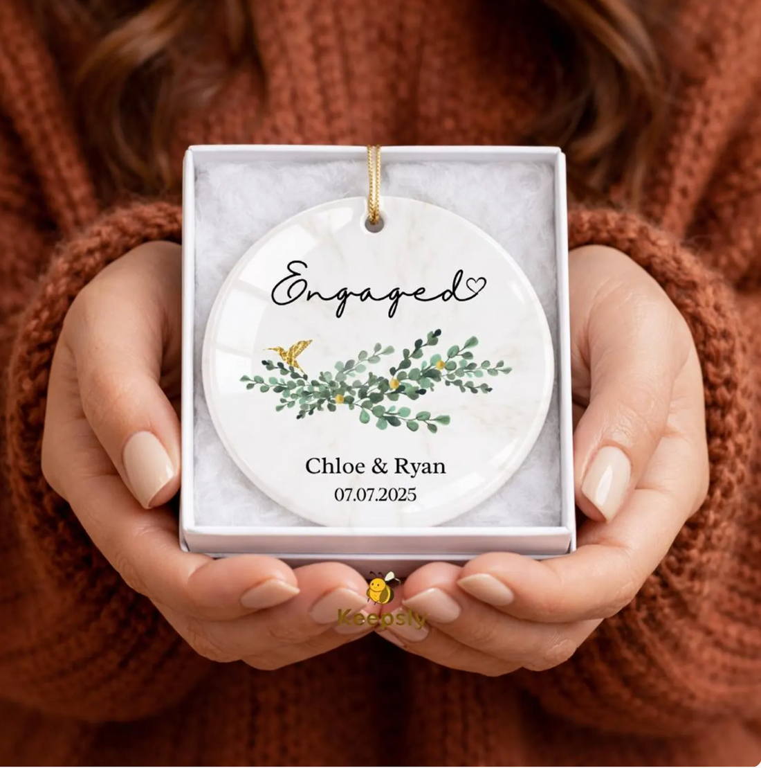 personalized christmas ornaments engaged couple in a gift box showing