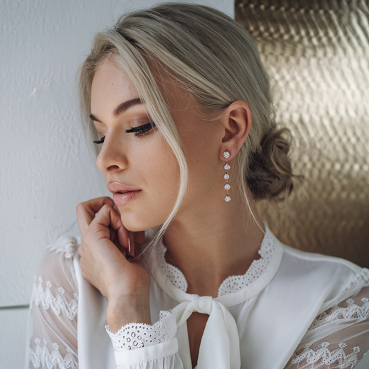 Dainty drop earrings are the must-have trend of the year—elegant, lightweight, and perfect for any look, from everyday chic to bridal beauty.
