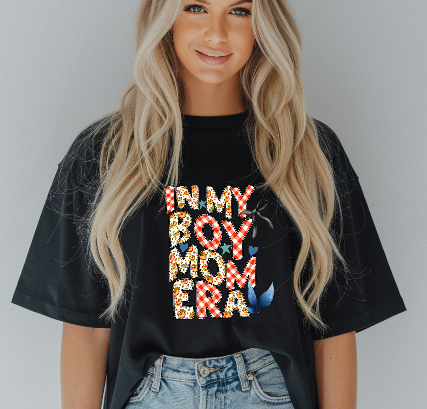 in my boy mom era shirt
retro floral font