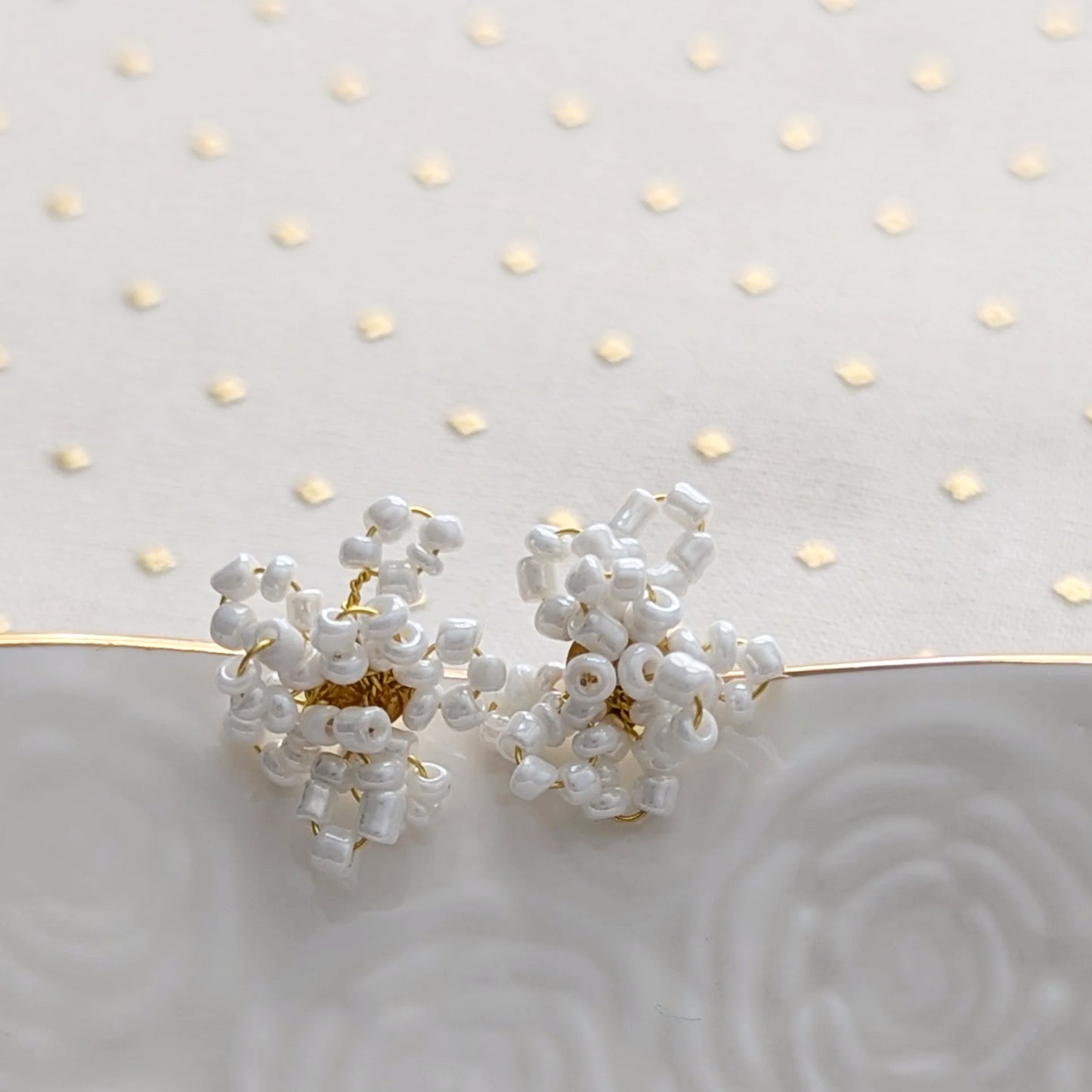 Intricate white glass bead and gold wire floral wedding earrings, 3/4 inch.