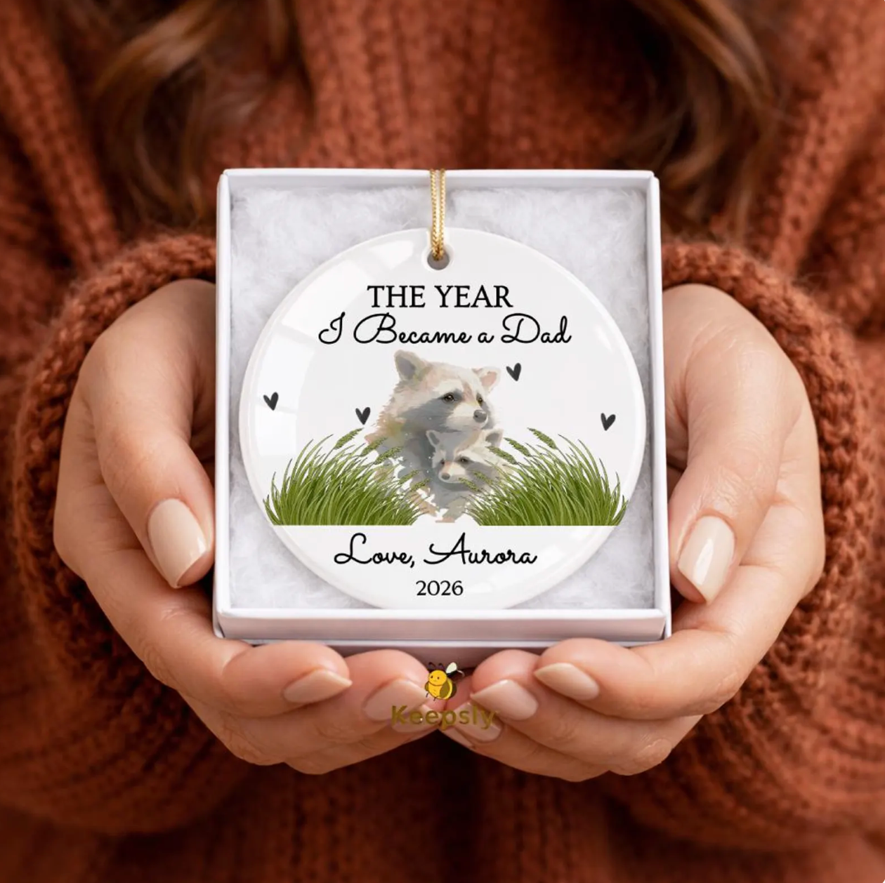 The Year I Became First Mother's Day Ceramic Ornament, Watercolor Raccoon Mom Keepsake 2026