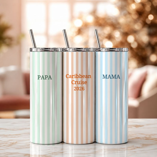 Three striped tumblers labeled 'PAPA', 'Caribbean Cruise 2026', and 'MAMA' on a table.