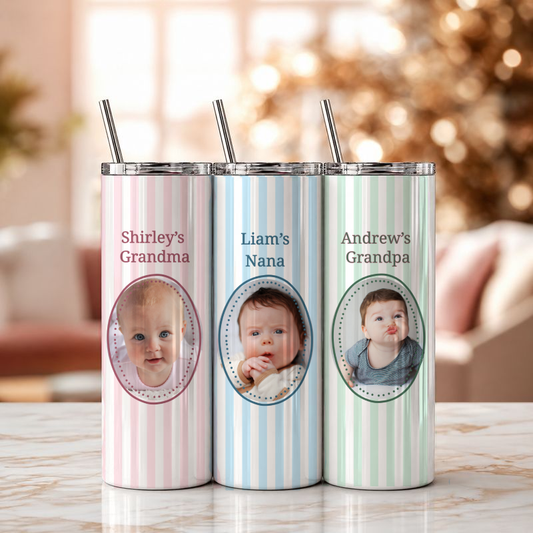 Three personalized tumblers with photos of babies and names on a blurred background