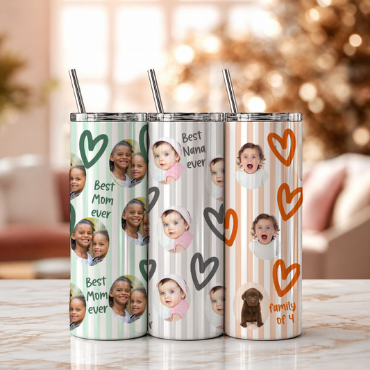 Three personalized tumblers with family photos and text on a wooden surface.