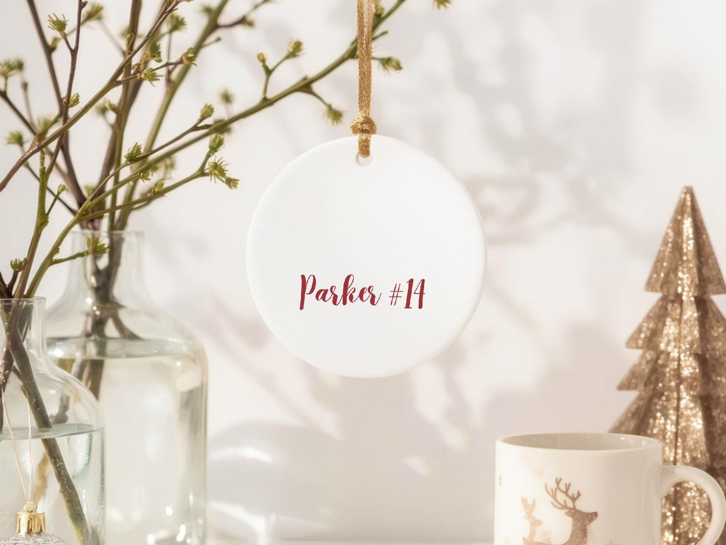 Round ceramic baseball ornament with cracked wall design and personalized back side name text