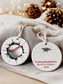 personalized cracked wall baseball ornament is showing the front and back side in a cozy table setting