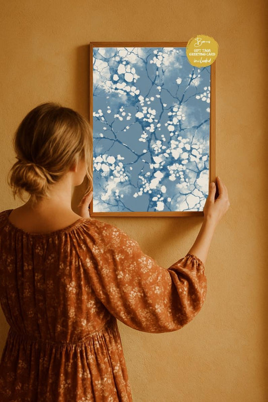 Boho minimalist blue abstract wall art framed and displayed by a woman in a cozy neutral room, modern printable artwork mockup, digital download home decor.