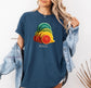 A woman is wearing a midnight blue Comfort colors shirt with a tropical citrus Mexico graphic