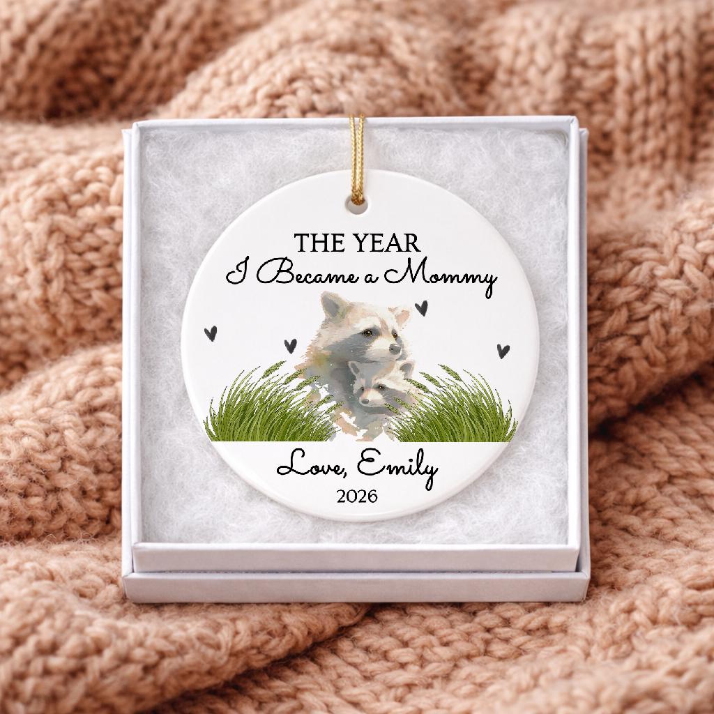The Year I Became First Mother's Day Ornament, Watercolor Raccoon Mom Keepsake 2026