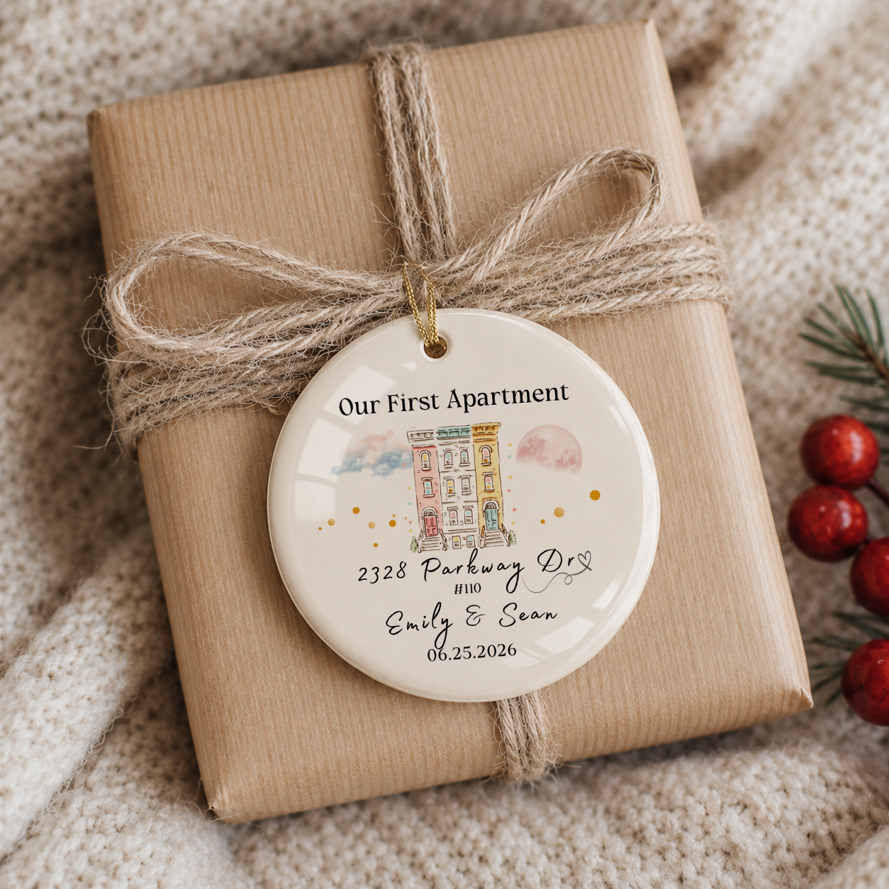Gift wrapped in brown paper with a decorative ornament on a textured surface.