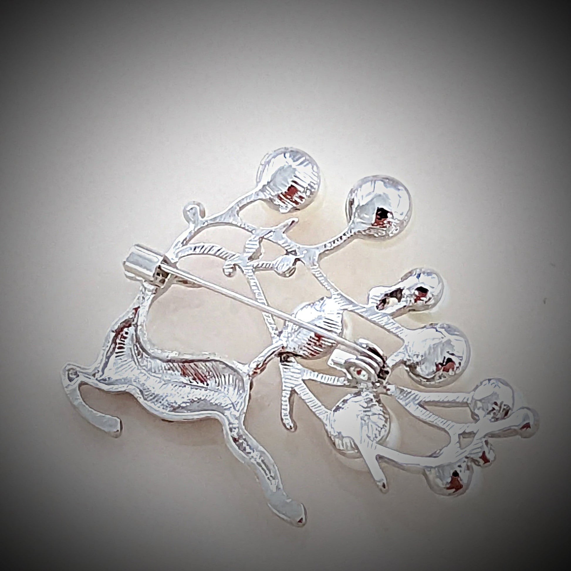 crystal reindeer pin with pearl antler
