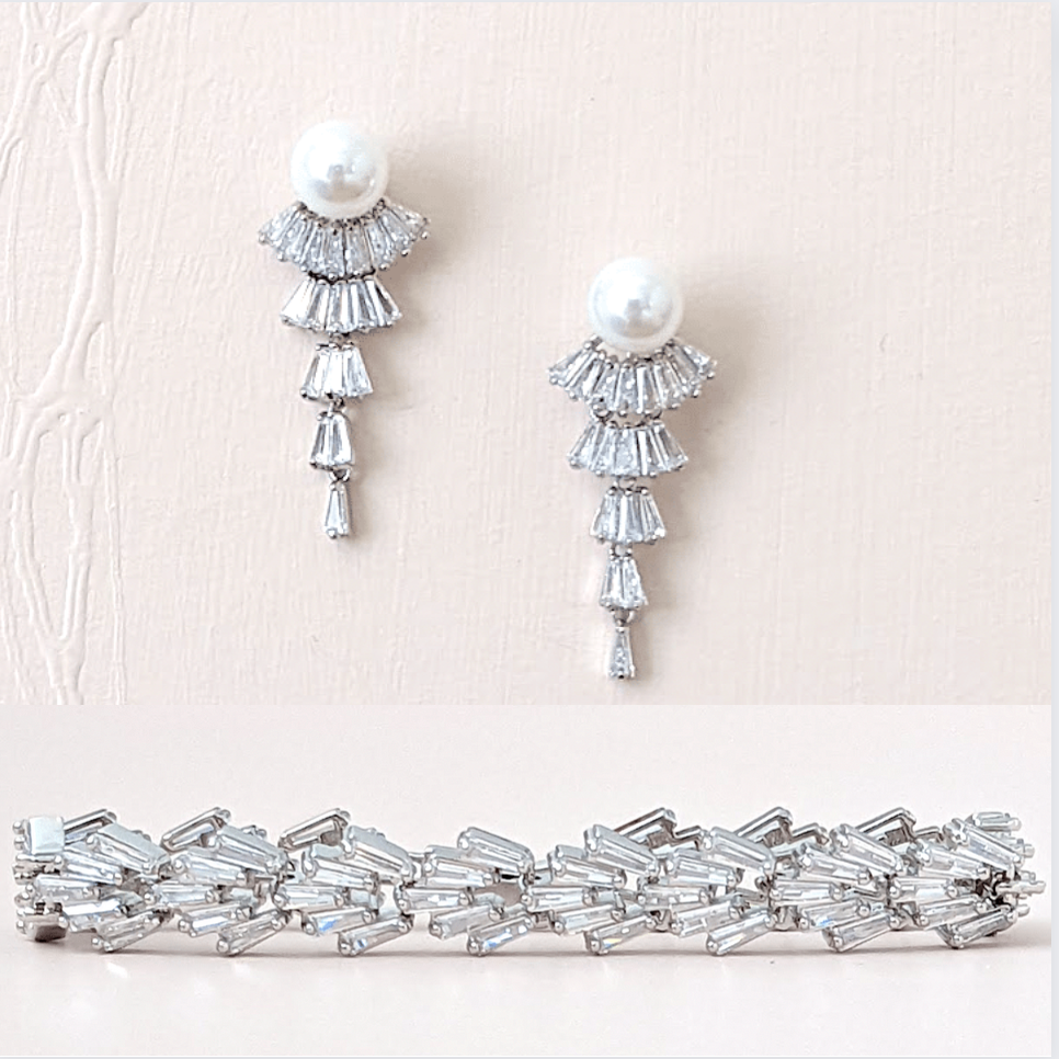 Flapper design vintage bridal earrings with baguette cubic zirconium and pearls. Perfect accessory for any wedding dress style. Subtle yet eye-catching. Available in silver and gold finishes